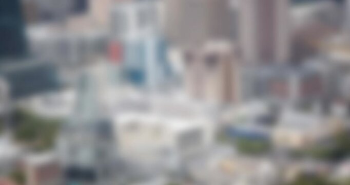 Animation of red pattern over out of focus cityscape