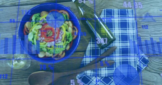 Blue salad bowl sitting centered on wooden plank tabletop showing green bottle, glass, data overlay