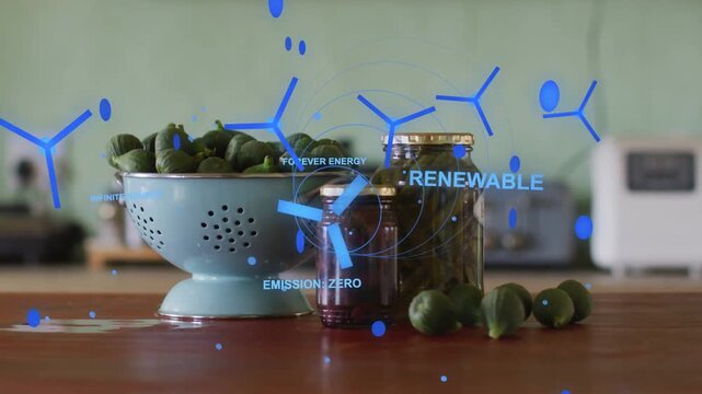 Tabletop colander  and  jars receiving AR overlay animating turbine icons HUD, showing renewable ene