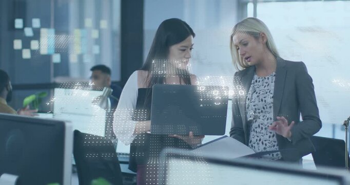 Pointing blonde manager in grey blazer clarifying pages in office with laptop folder digital grid