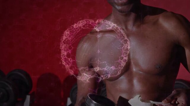 Man scooping supplement powder for workout in gym, pulsing brain graphic overlaying chest, face