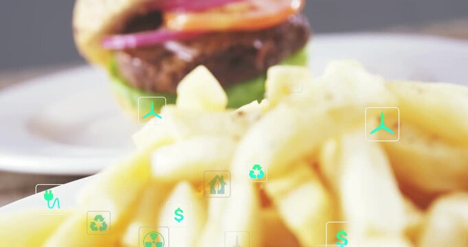 Camera racking focus while fries moving forward, teal eco icons spreading, showing food cost impact