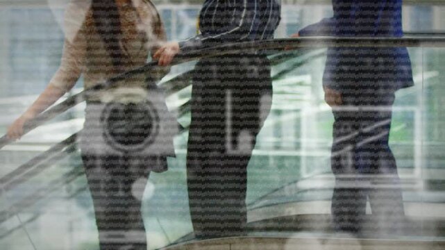 Third entering from right starting trio walking curved rail, rings sweeping, passing right to exit