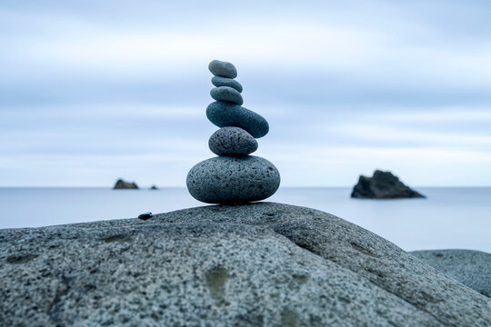 Pile of rocks on the shore by the sea, Shizuoka, Japan
