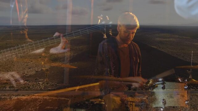 Drummer rising after snare hit, striking drums while hands overlay coast, fusing music and scene