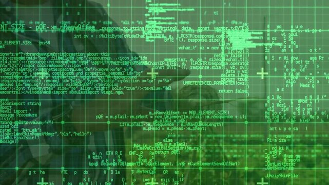 Operator getting ping and holding radio while scanning area, revealing military gear via green grid