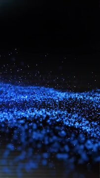 Vertical video: Blue sparks sea rippling in dark tech demo pink ribbon arising showing cubes fading