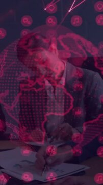 Vertical video: Man leaning over meeting signing docs after business review red globe overlaying