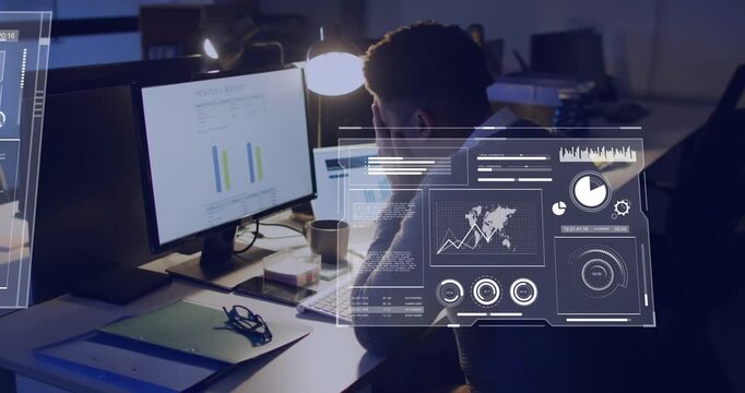 Finance analyst working late, monitor updating and spawning holo charts around desk, analyzing data
