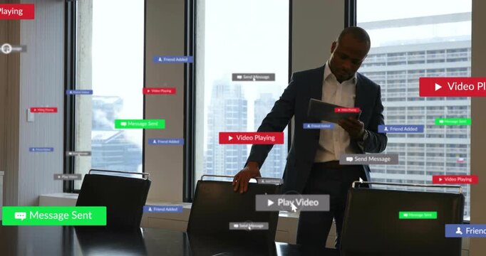 Business exec tapping tablet making UI overlays changing into play and sent badges for review