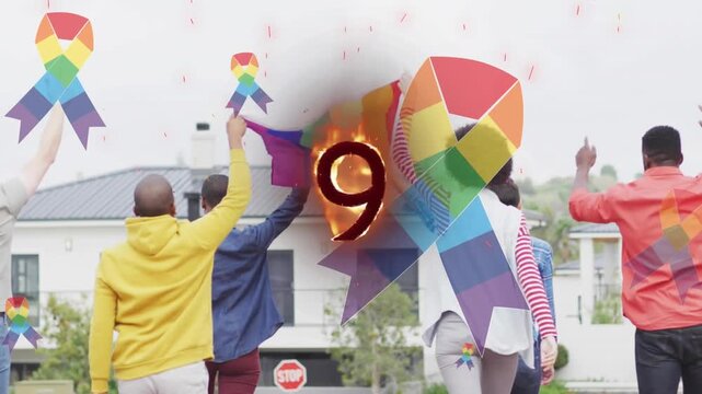 Animation of gold confetti over diverse happy children and clown having fun at party