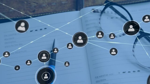 Animation of network of connections with icons over glasses and notebook