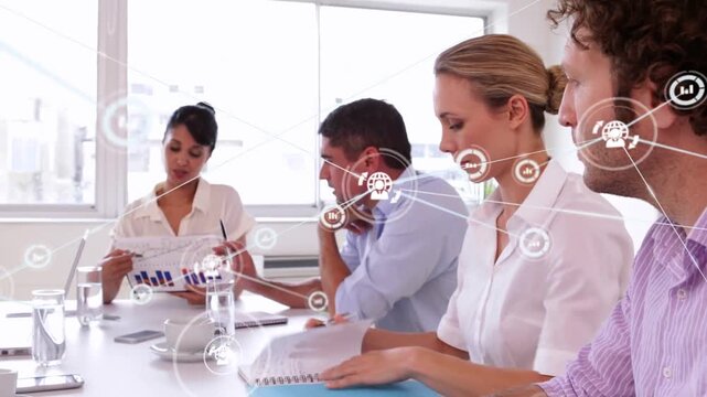 Vertical video: Presenter holding chart and pointing team noting as HUD overlaying driving business