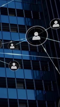 Vertical video: Avatar network growing on glass facade, left node starting pulsing hub for tech