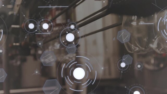 Conveyor moving bottles under nozzles, HUD graphics pulsing and monitoring fill quality in plant