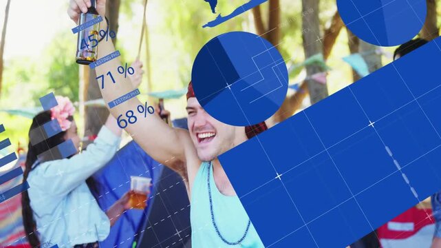 Man raising bottle in park, friends dancing, blue charts covering people, showing marketing data