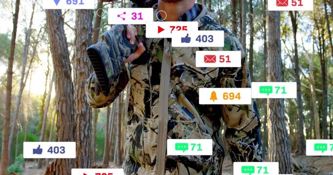Hunter walking pine path cam rising sparking social metrics holding rifle pink strap scanning prey