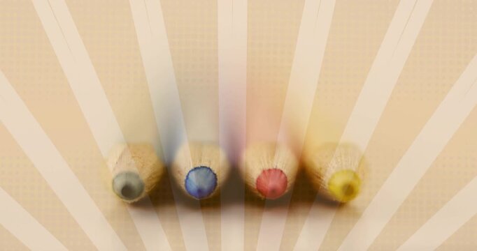 Camera refocusing pencils sharpening blur fading showing four cores on beige stripes for design