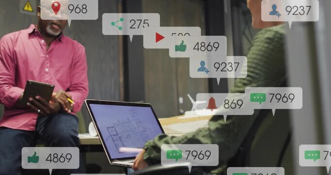 Vertical video: Design pair reviewing plan, woman using laptop, bubbles filling frame during review