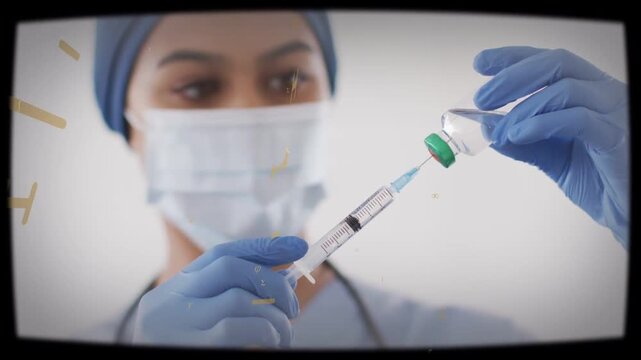 Female medical worker aligning syringe with green vial, drawing dose while gold overlay guiding