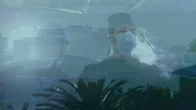 Surgical team, assistant starting raising gauze toward center forehead, prepping city palm overlay