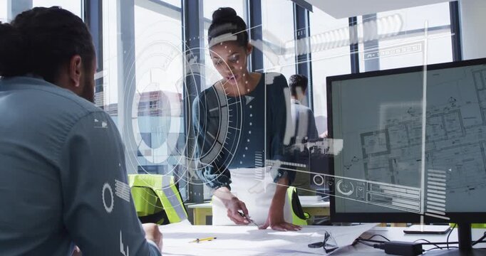 Lead woman pointing and marking design plans for review, causing HUD to spread across screen plan