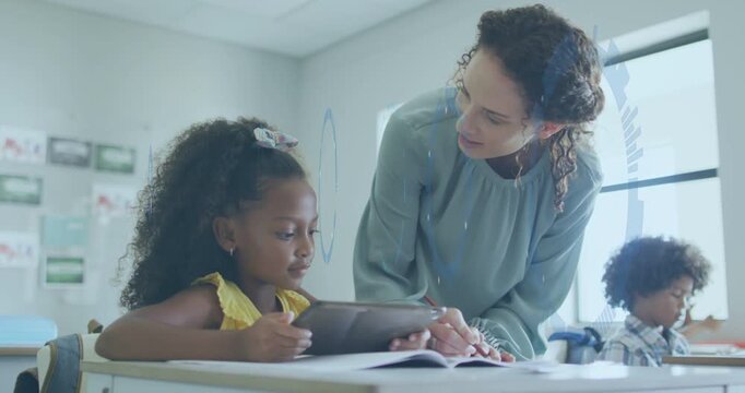 Teacher leaning over girl guiding book with pencil, causing blue HUD while girl using tablet lesson
