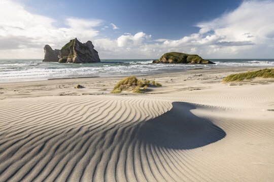 Rock island on Wharariki beach, Wharariki Beach, Golden Bay, Southland, New Zealand