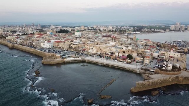 aerial sunset view of the Old City of Acre Akko, UNESCO World Heritage site in Israel