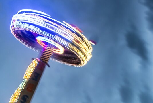 Ride at night, light trails, Munich Spring Festival, Theresienwiese, Munich, Bavaria, Germany