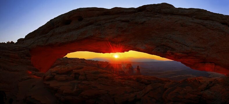 Sunrise at Mesa Arch stone arch, Canyonlands National Park, near Moab, Utah, United States