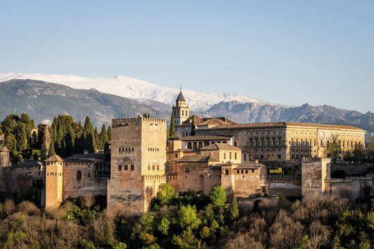Alhambra on the Sabikah hill, Moorish citadel, Nasrid palaces, Palace of Charles the Fifth, behind Sierra Nevada with snow, Granada, Andalucia, Spain
