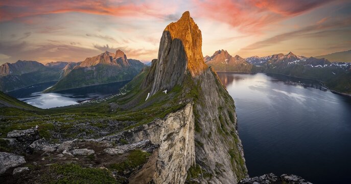 Dramatic clouds, evening mood, steep mountain Segla, fjord Mefjords with mountains, island Senja, Troms, Norway