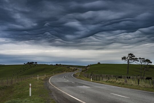 Highway, dramatic Mammatus Clouds, Aranga, Northland, New Zealand