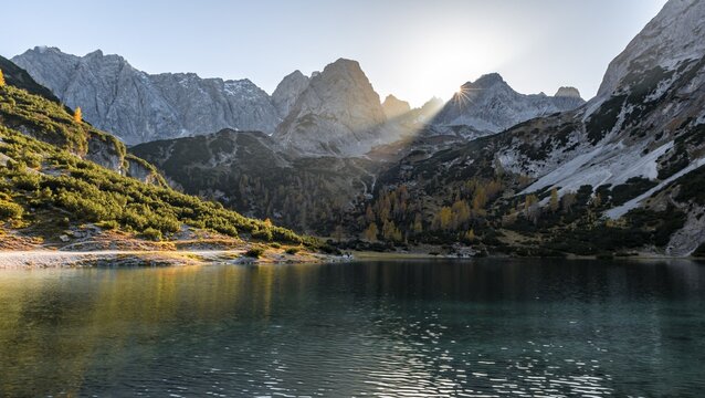 Mountains are reflected in the Seebensee, Sonnenspitze, Schartenkopf and Vorderer Drachenkopf, Ehrwald, Mieminger Kette, Tyrol, Austria