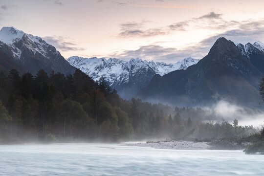 River Soca with Svinjak Mountain in the morning, Soca Valley, Kanin Mountains, Julian Alps, Bovec, Triglav National Park, Slovenia