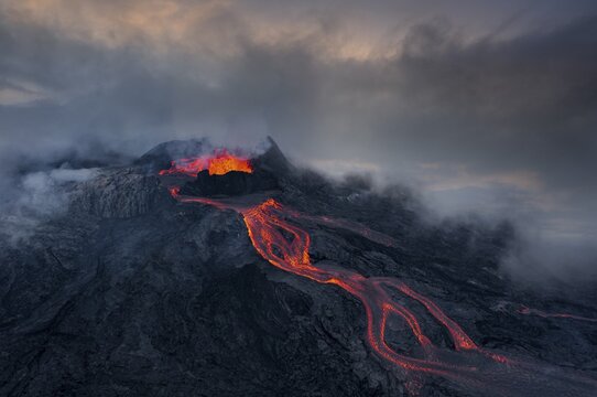 Aerial view, erupting volcano with lava fountains and lava field, crater with erupting lava and lava flow, Fagradalsfjall, Reykjanes Peninsula, Iceland