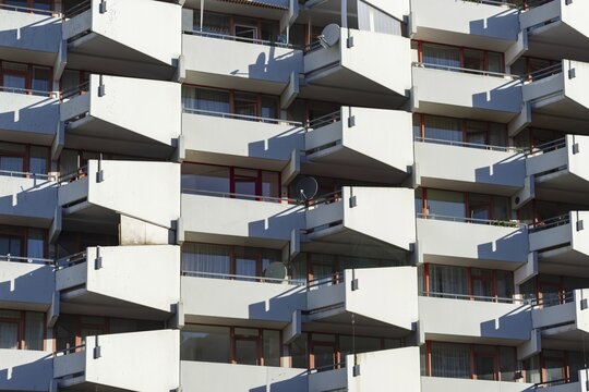 High-rise residential building with balconies and satellite dishes, Trabantenstadt Chorweiler in Cologne, North Rhine-Westphalia, Germany