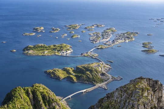 View of fishing village Henningsvaer from the top of Festv&aring;gtinden, Small islands connected by road and bridges, Austv&aring;g&oslash;ya, Lofoten, Norway