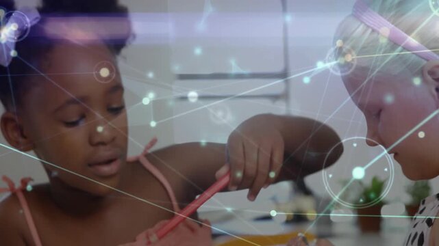 Two girls reaching for pencil cup, pulling red stick and working for learning overlay marking tools