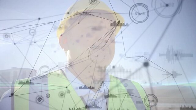 Site worker turning head upward as animated network nodes sweeping across vest, tracking site data