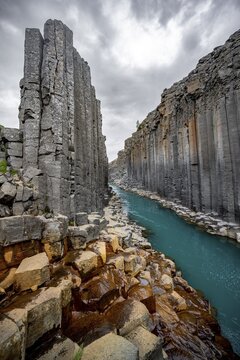 Stu&eth;lagil Canyon, turquoise river between basalt columns, Egilsstadir, Iceland