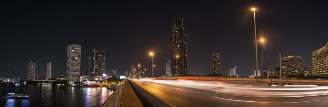 Skyline, Bridge over the river Mae Nam Chao Phraya, at night, Bangkok, Thailand