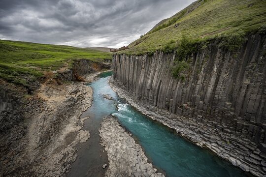 Stu&eth;lagil Canyon, turquoise river between basalt columns, Egilsstadir, Iceland