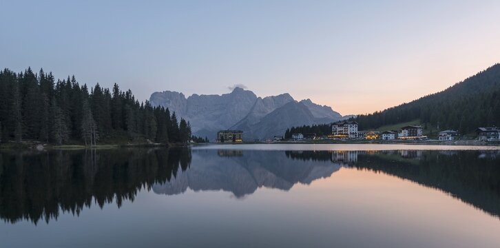 Lake Misurina at sunset, behind medical clinic Istituto Pio XII, Sorapis mountain group, Dolomites, South Tyrol, Bolzano, Italy