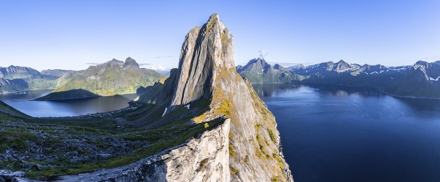 Steep mountain Segla, fjord Mefjorden with mountains, island Senja, Troms, Norway