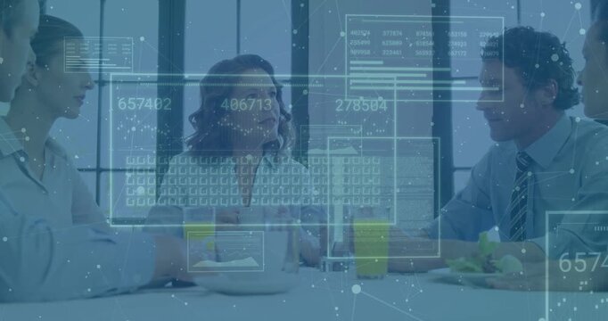 Vertical video: Speaking lead at meeting table in blouse man in tie gesturing on data HUD appearing