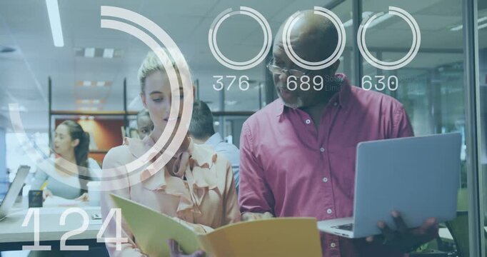 Man pointing to folder and guiding woman, animated gauges rising while reviewing business data
