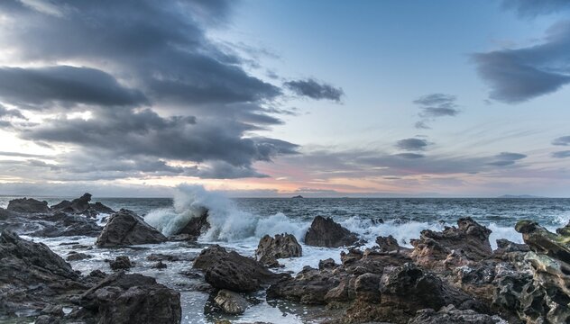 Rocky coast with surf, twilight, Bay of Plenty Region, North Island, New Zealand