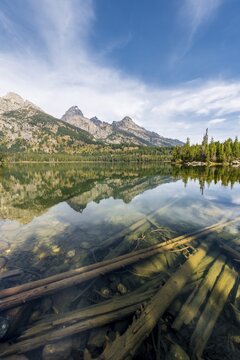 Lake, reflection in Taggart Lake, view of the Teton Range, Grand Teton National Park, Wyoming, USA